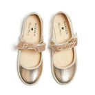 Meri Meri x Marjen Missy metallic gold Mary Jane with velvet bow, top-down view of pair