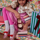 Meri Meri x Marjen Sabrina pink glitter Mary Jane with red velvet bow, child opening a shoe box